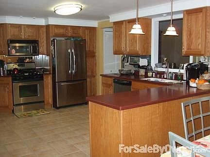 Kitchen was completely remodeled
						:
						Stainless steel appliances clean like new and incl.
Corian countertops and sink