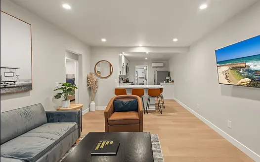 Modern and spacious living area with a queen sleeper perfect for family gatherings