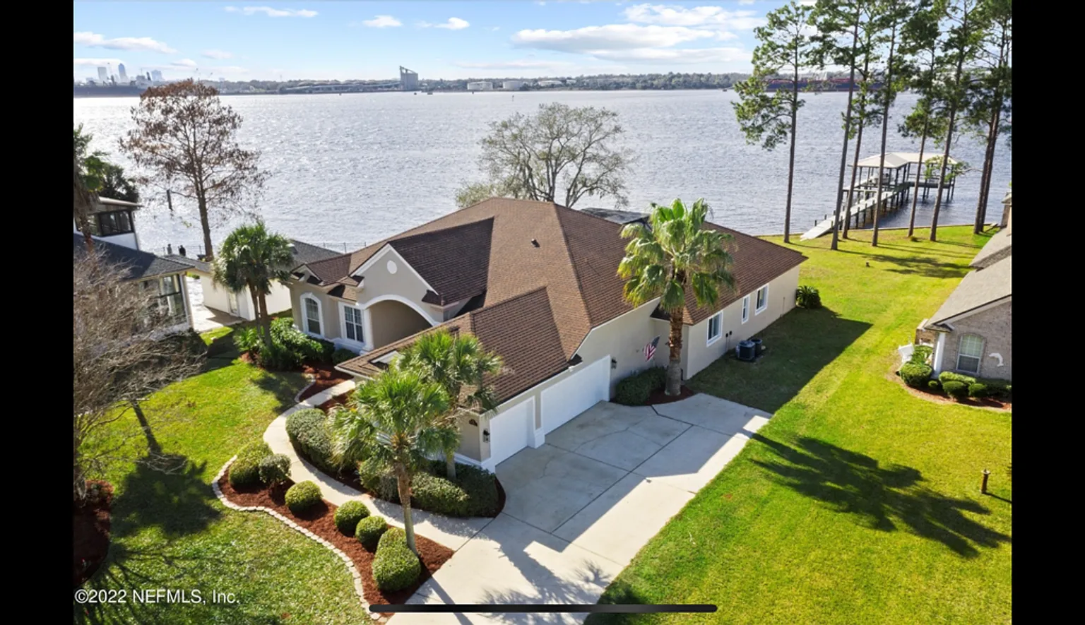 Live Like You're on Vacation Every Day! Stunning Riverfront Home with Unforgettable Sunsets! — Photo 2