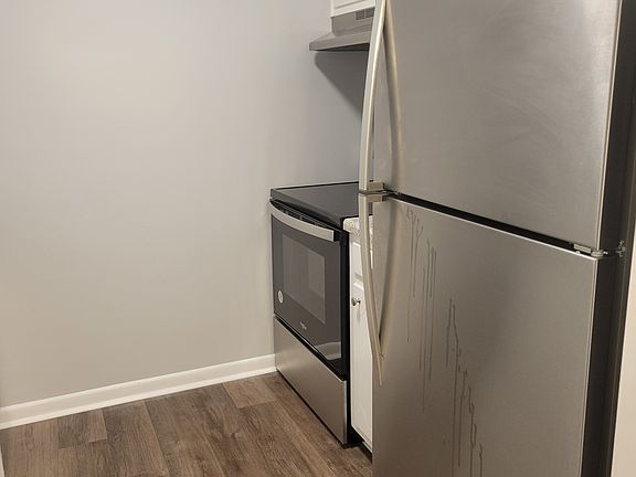 Kitchen with glass top stove