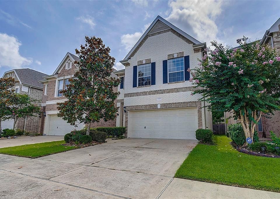 Lovely brick patio home with extra parking