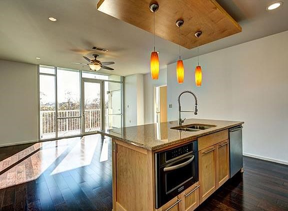 Island is open to living area and is home to the built-in Ki