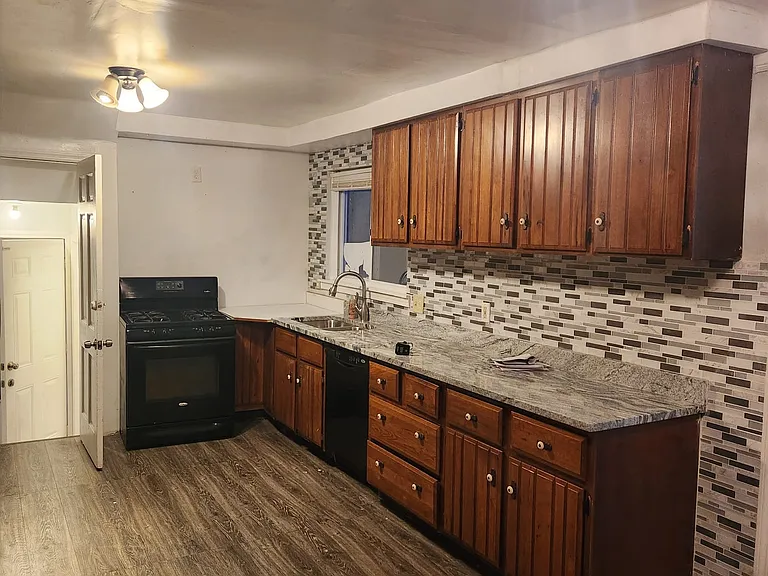 7747 Appoline St — Photo 10