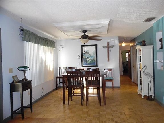 Dining area also features parquet flooring