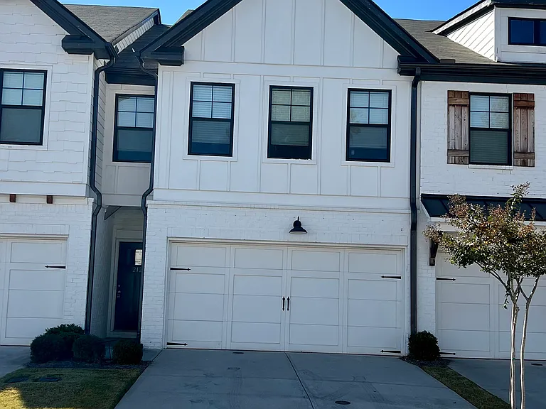 Front entrance, featuring a 2 car garage