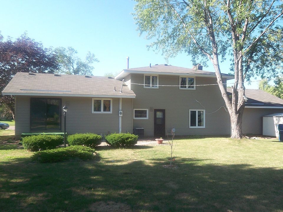 Rear of home with large yard