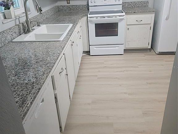 2nd image of 1706 BELLEAIR FOREST DRIVE #310