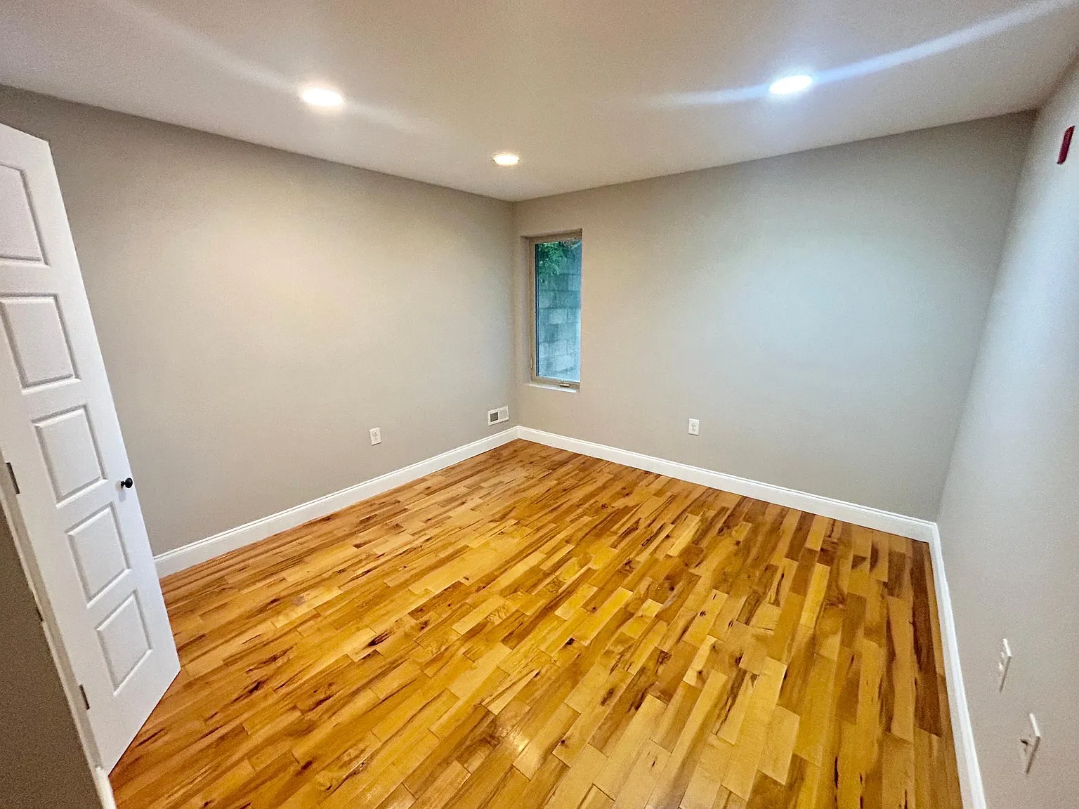 Spacious 3-Bedroom, 2-Bath Apartment with Finished Basement, Private Patio, and In-Unit Laundry — Photo 3