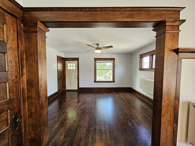 Livingroom has a front storage/coat closet. Access door to private upper front porch. All windows are new and add to the unit's energy efficiency.
