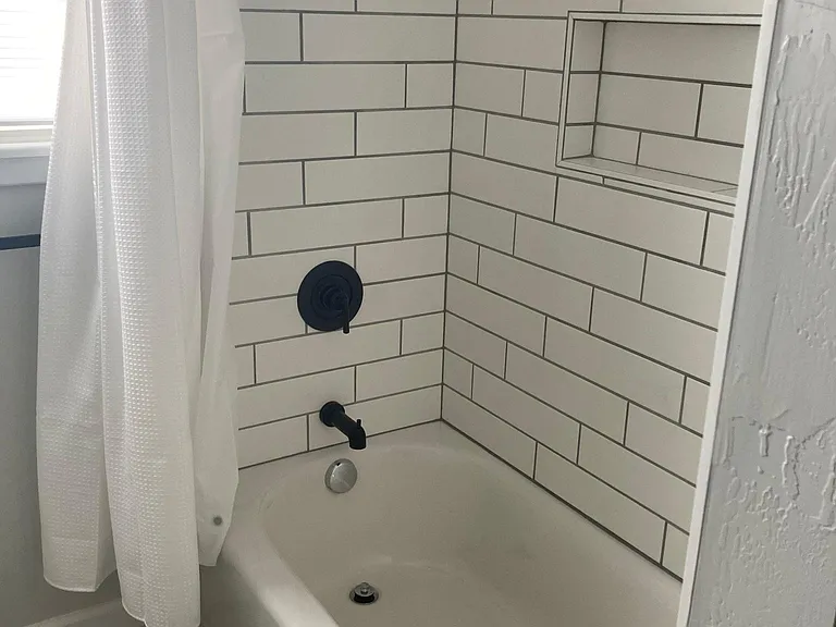 Bathroom tub and shower - all new.