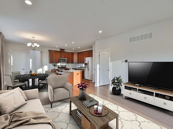 Kitchen Opens to Living and Dining Rooms