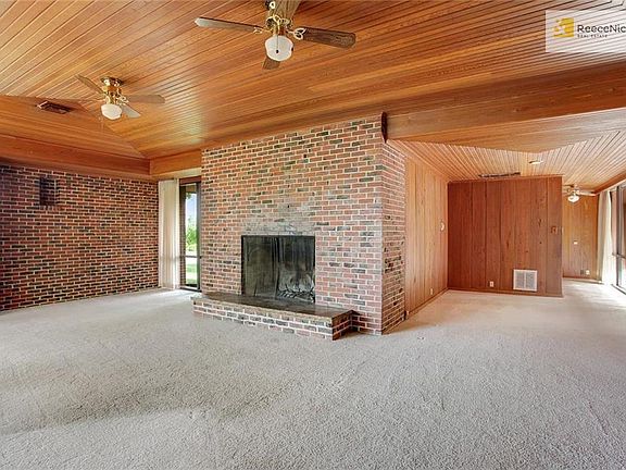 Painstakingly Crafted Wood Ceiling In Living and Formal Dining Area