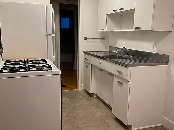Kitchen. Retro metal cabinets with stainless countertop.
