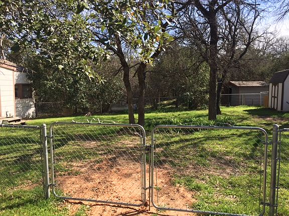 Double gate fenced back yard