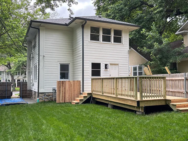 New Deck, fire pit and grass.