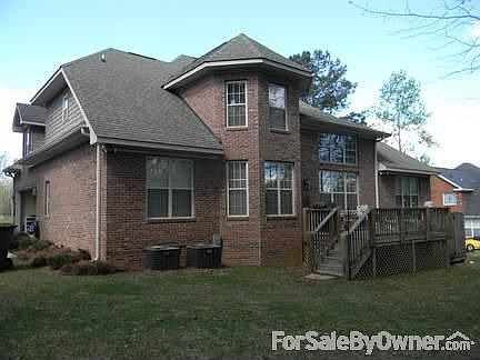 Two-story front entrance
						:
						Graceful arch-ways throughout the home