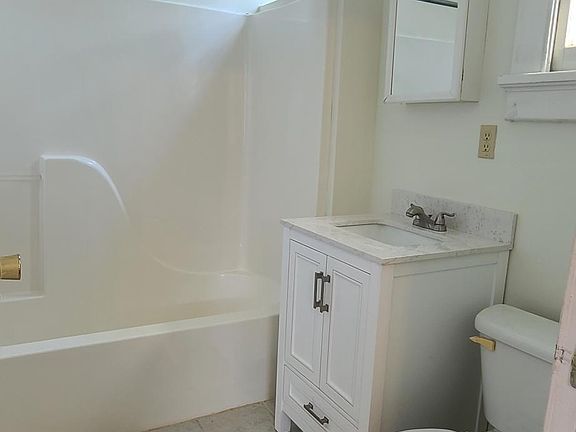 BATH ATTACHED TO BED #1