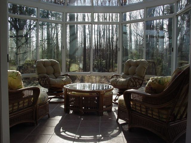The Sunroom offers views of the protected county woodlands