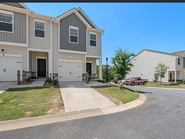 Corner townhouse with in law suite in the basement.