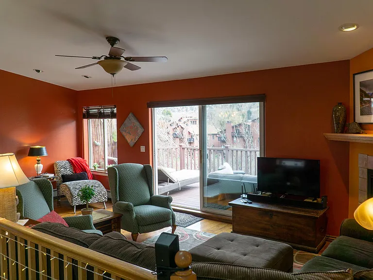 Top floor living area. 
Also on top floor - kitchen, walk-in pantry, dining area, game area and half bath.