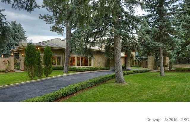 Fabulous luxury estate on 1.61 acres bordering the private Pourtales Park. Port Corchere entrance, stone & stucco exterior.