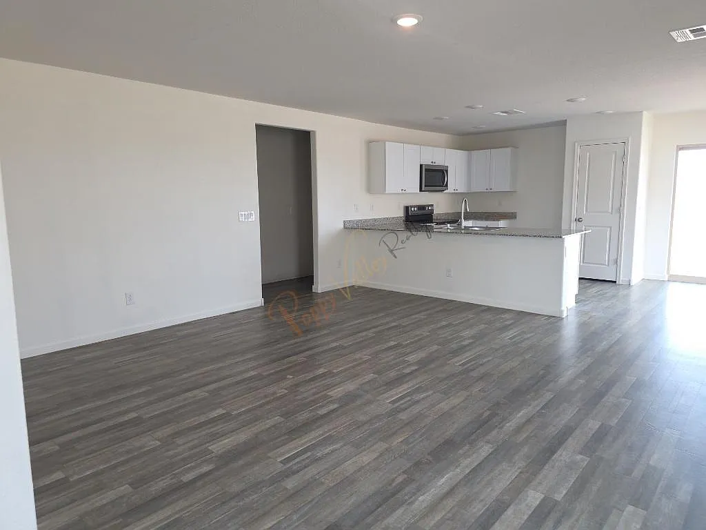 3471 E Ames Ave — Photo 3