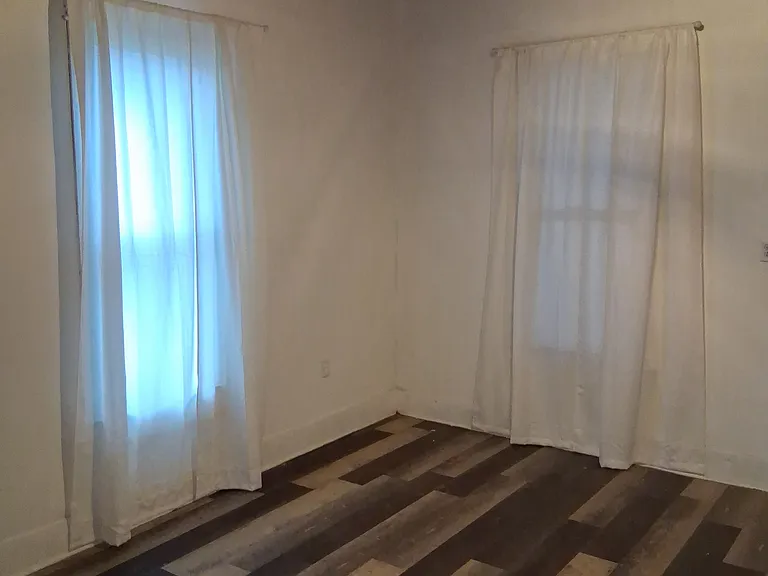 living room from kitchen left view 10 foot tall walls.