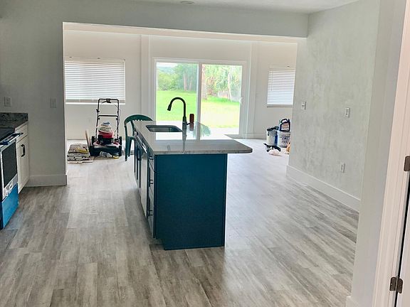entrance looking into kitchen and living room
