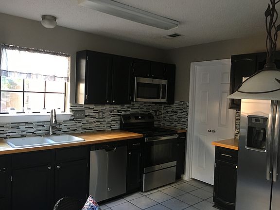 Doors lead to laundry room