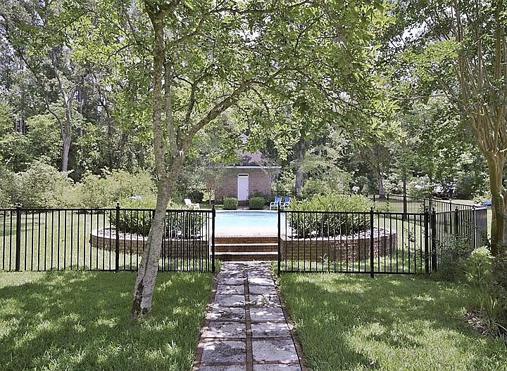 Fenced pool with cabana