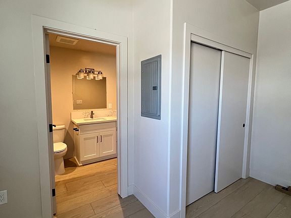 Large bedroom #1 has en suite 3rd full bathroom, two windows for great light