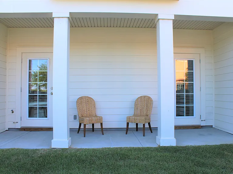 Private covered backporch off bedrooms