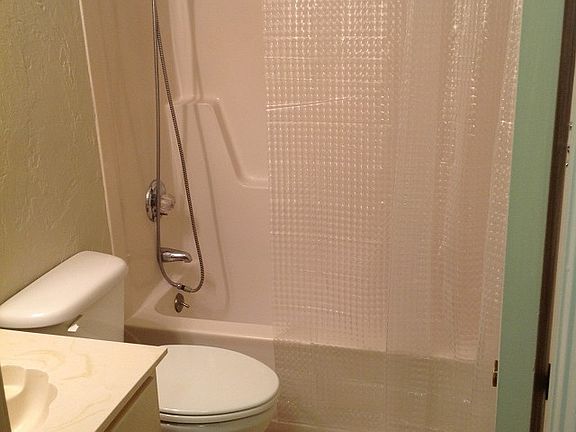 Hall bath with tub and shower