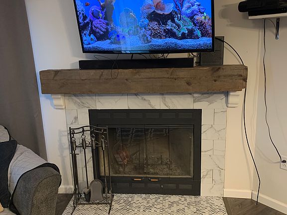 Updated fireplace w/ mantel.