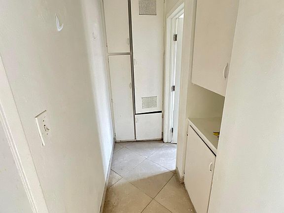 Hallway with extra Storage Space w/Tile Floors...