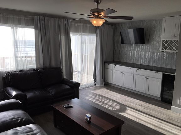 Living area with bar and wine cooler