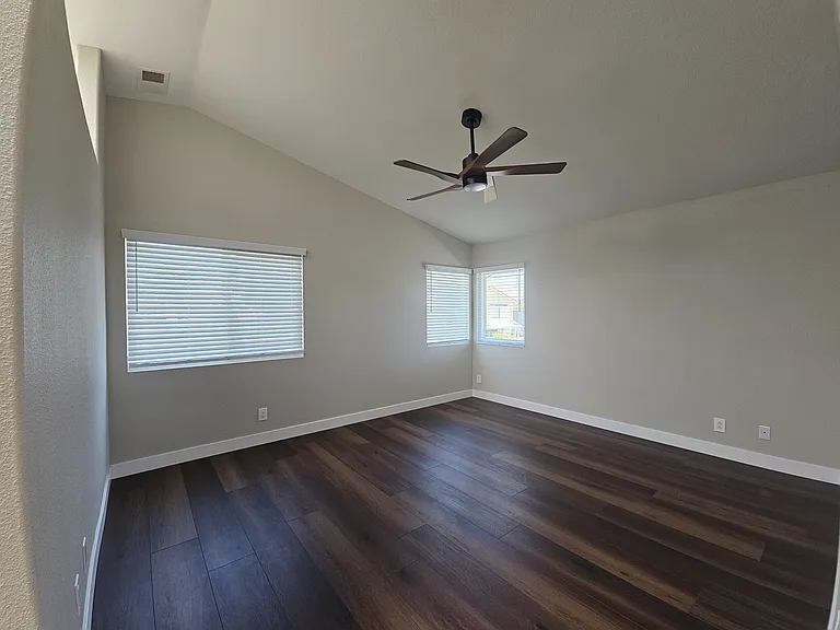 Master bedroom. Room for a king-sized bed and a dresser. All bedrooms have brand new cordless wood blinds.