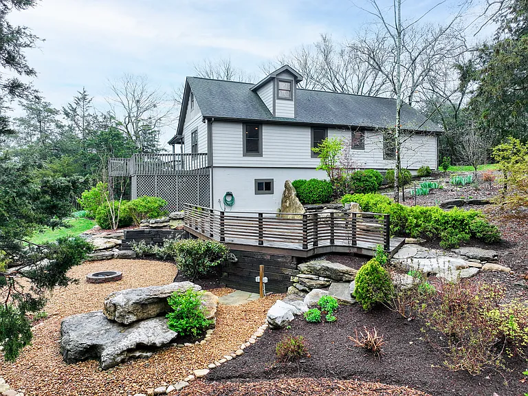 Side view of house - large deck and lower fire pit