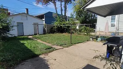 Fenced in yard and Garage