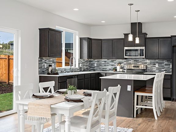 Kitchen to sliders and back patio.