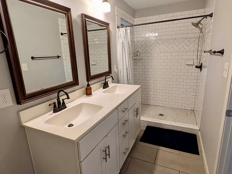 Second bedroom bathroom with shower.