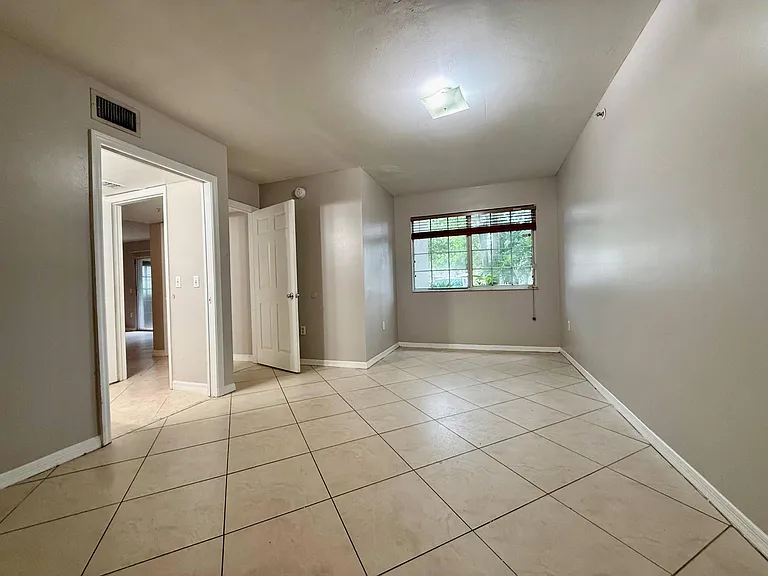 5065 Wiles Rd #105 — Photo 13