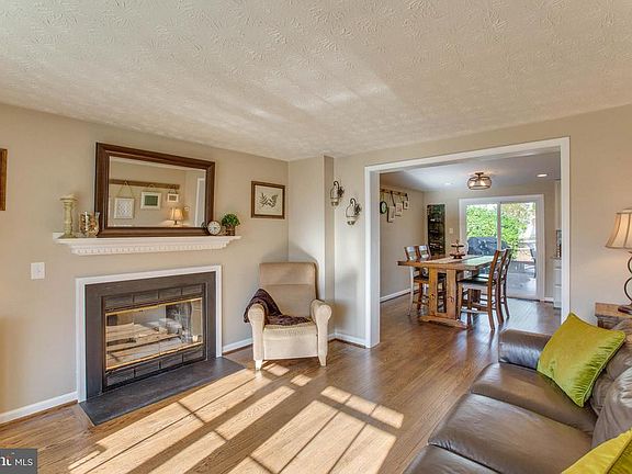 Living Room with a wood burning fireplace