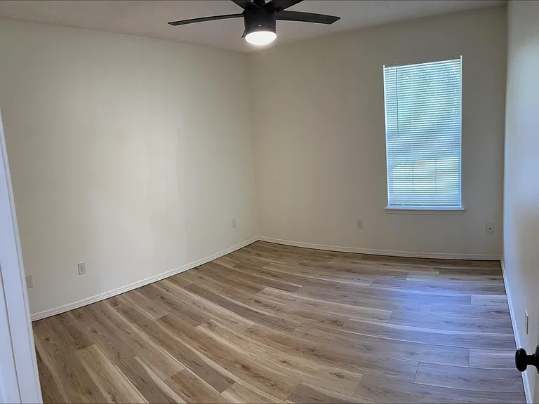 Bedroom 3 with window looking to backyard
11 x 10