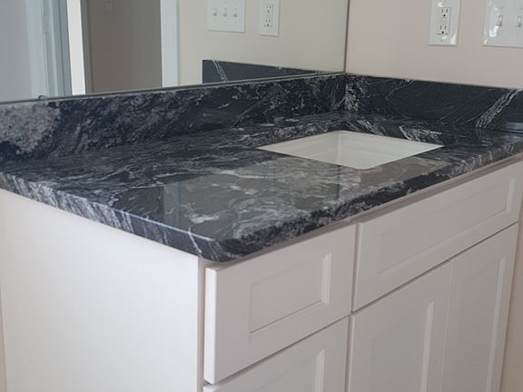 All wood cabinets / granite