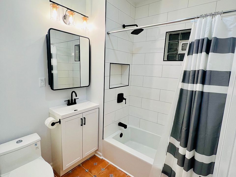 Newly remodeled bathroom with Spanish tiles.