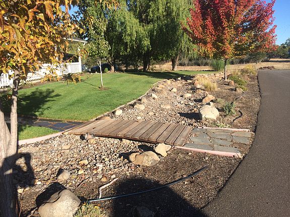Dry creek with walk bridge