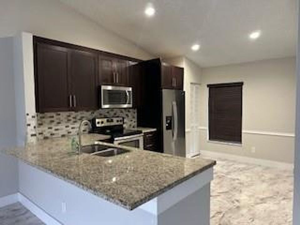 1st image of 5909 Woodland Point Pl