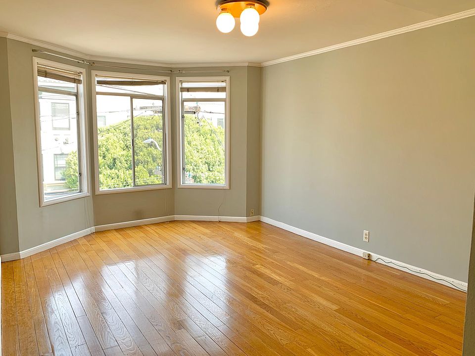 Bedroom #1 features hardwood floors, natural light, and good space.