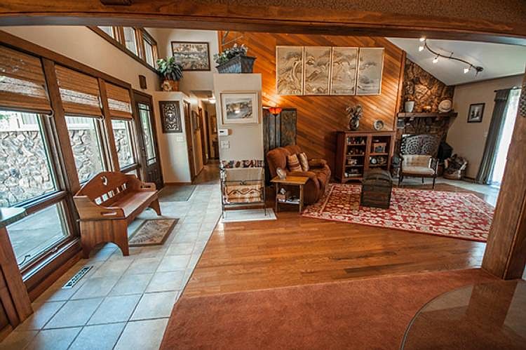 Armstrong tile lines the front entry and hallway which leads to all three bedrooms connected by the coat closet.